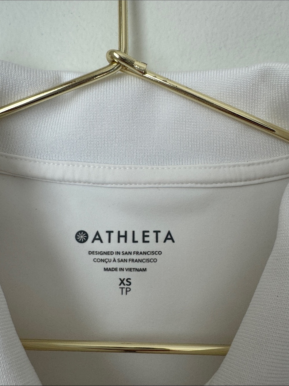 Athleta White Sleeveless Zip Polo with Navy Collar Trim - Picture 3 of 4